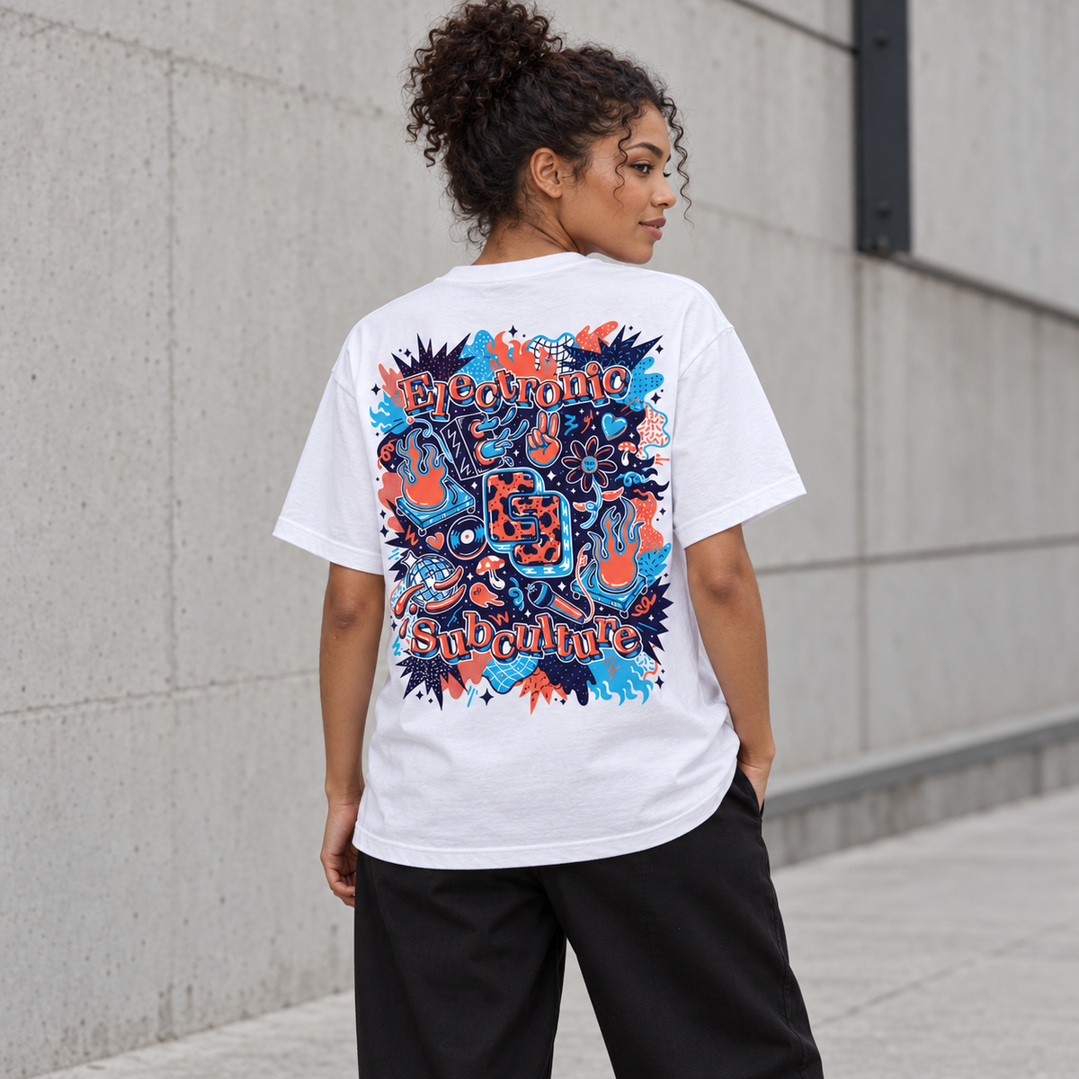 Model wearing the white BXL T-shirt with blue, coral and navy Electronic Subculture back artwork